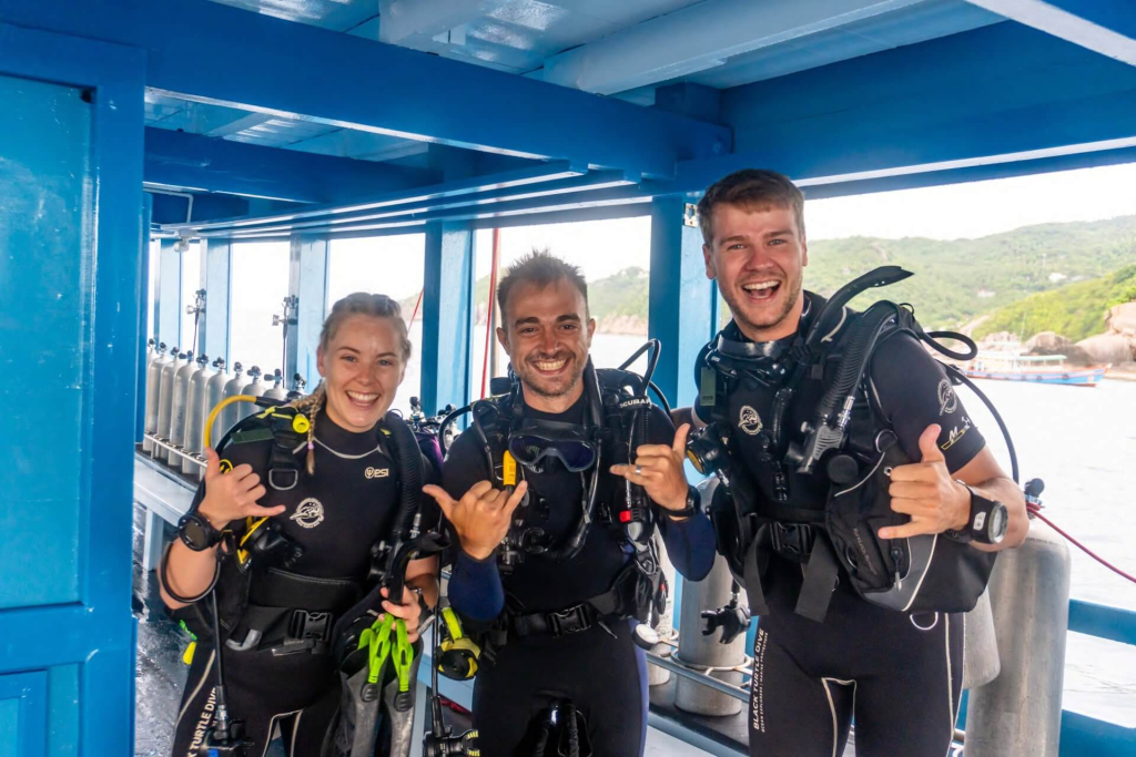 Advanced Open Water Diver exploring tropical coral reefs with strong buoyancy control during training in Koh Tao.