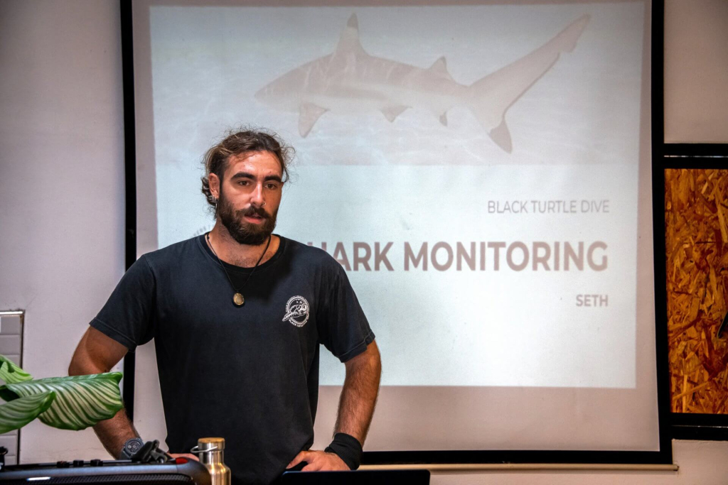 blackturtleconservation.com-shark-monitoring-classroom-training-koh-tao-thailand Instructor explaining shark monitoring research methods during classroom training at Black Turtle Conservation, Koh Tao, Thailand.